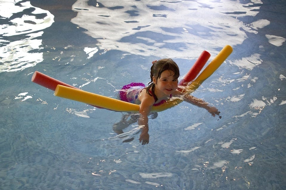 Girls swimming pool noodle